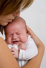 woman with a crying baby