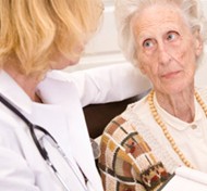 woman being told she has alzheimers