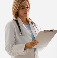 doctor looking at chart