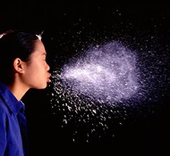 flu virus spreads by sneezing