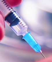 woman injecting her medication