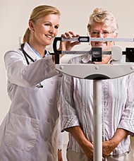 Getting weighed at the doctors office